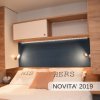 Camera da letto con armadio e illuminazione a LED.